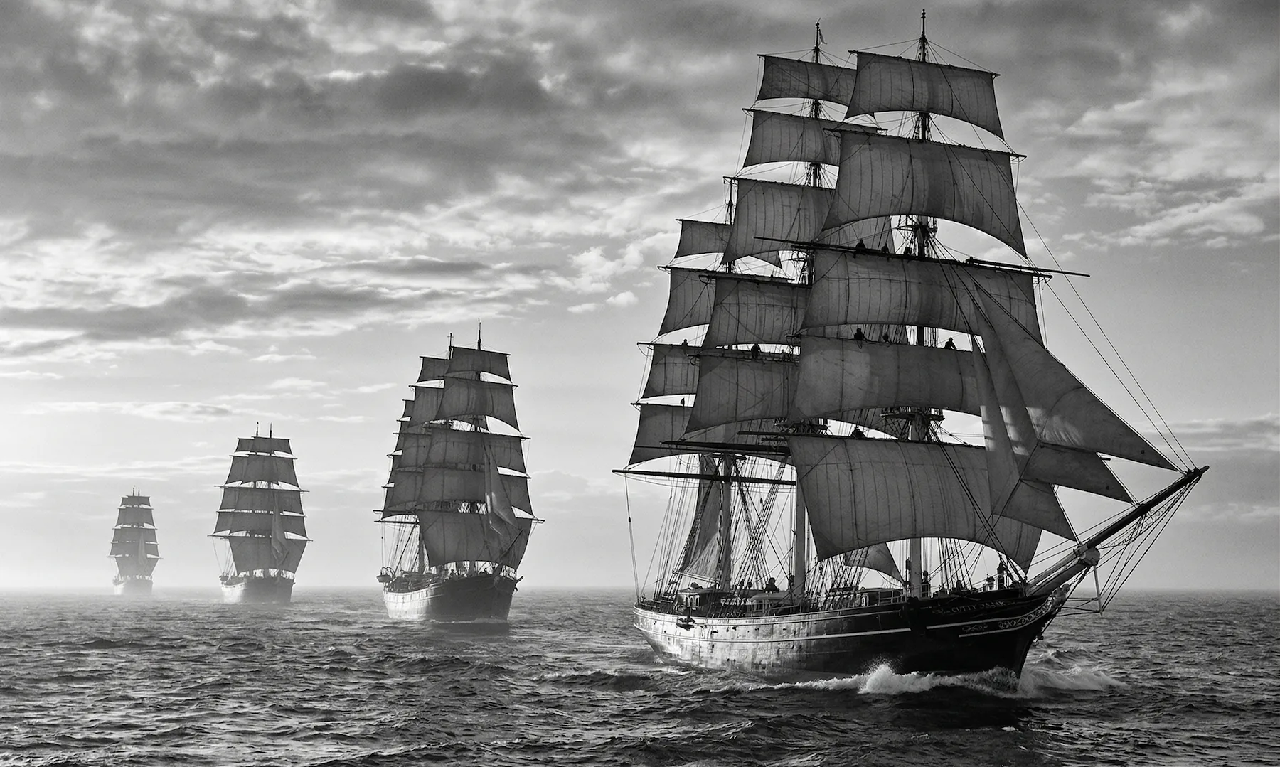 Clipper ships crossing the ocean on a historic tea transport route